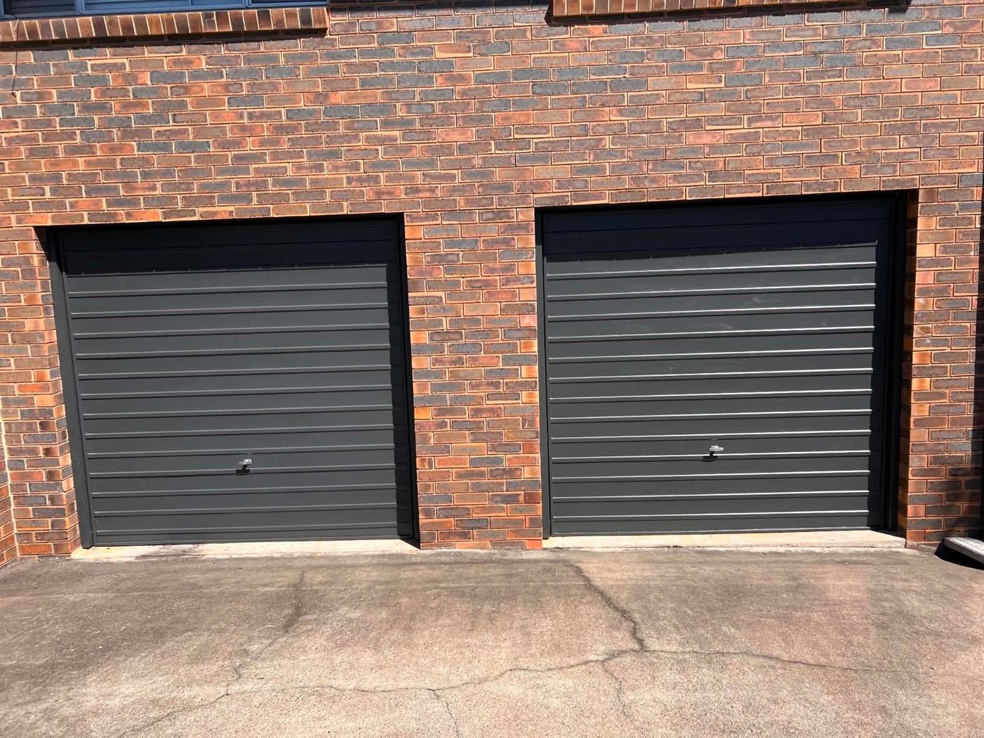 Garage doors repainted charcoal grey