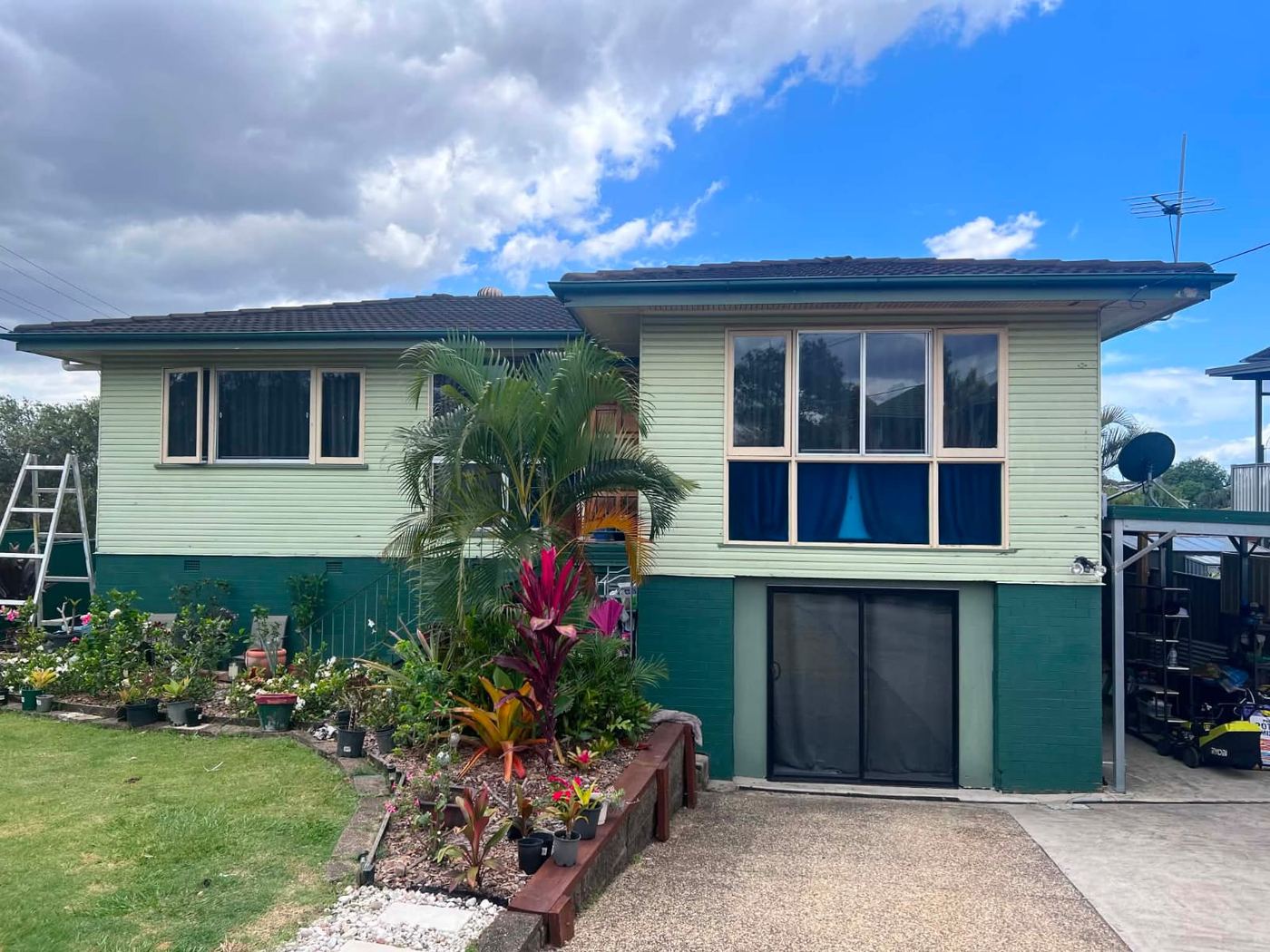 Highset Brisbane home in old mint green before repaint