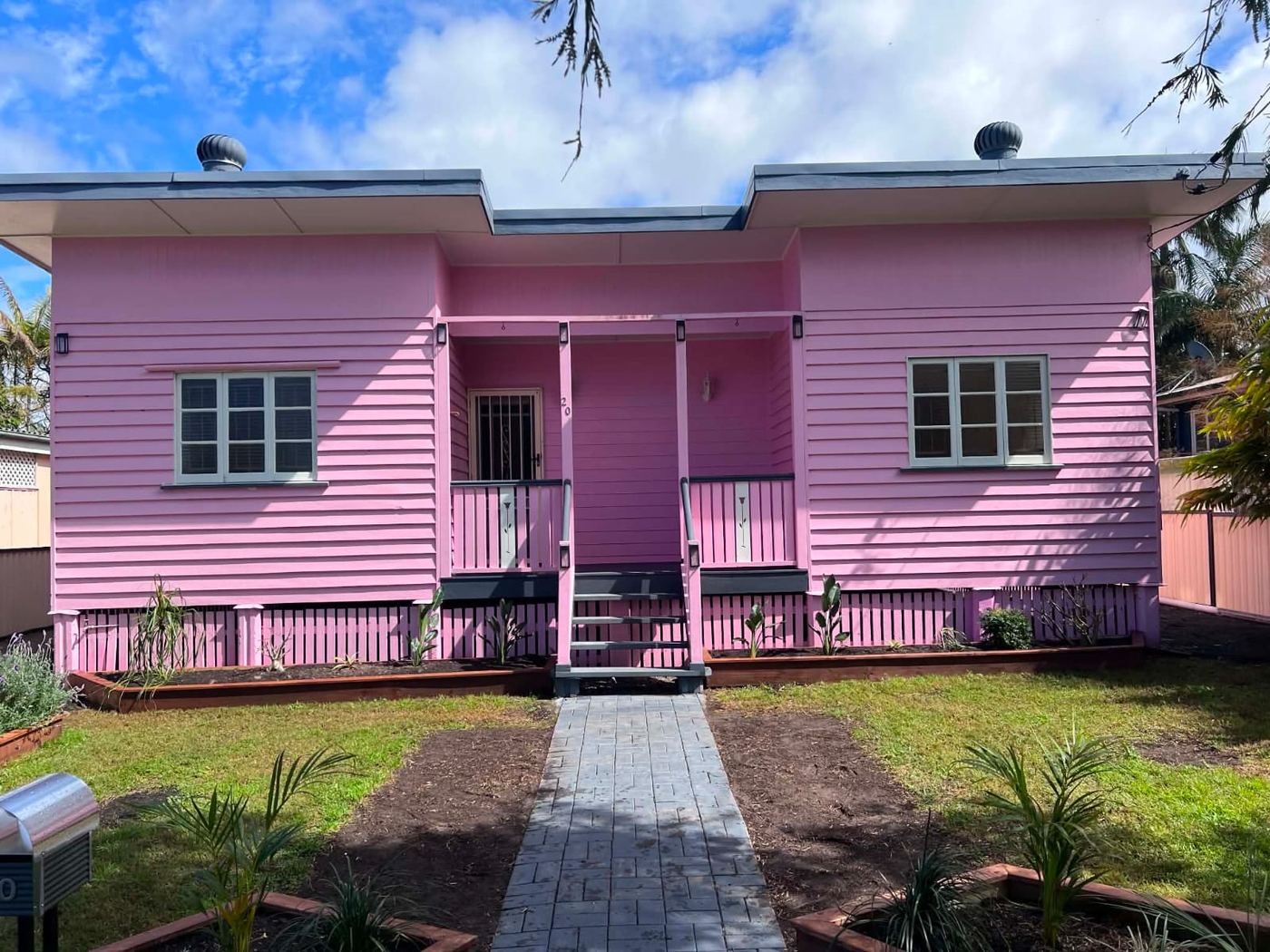 Pink weatherboard Brisbane home before repaint