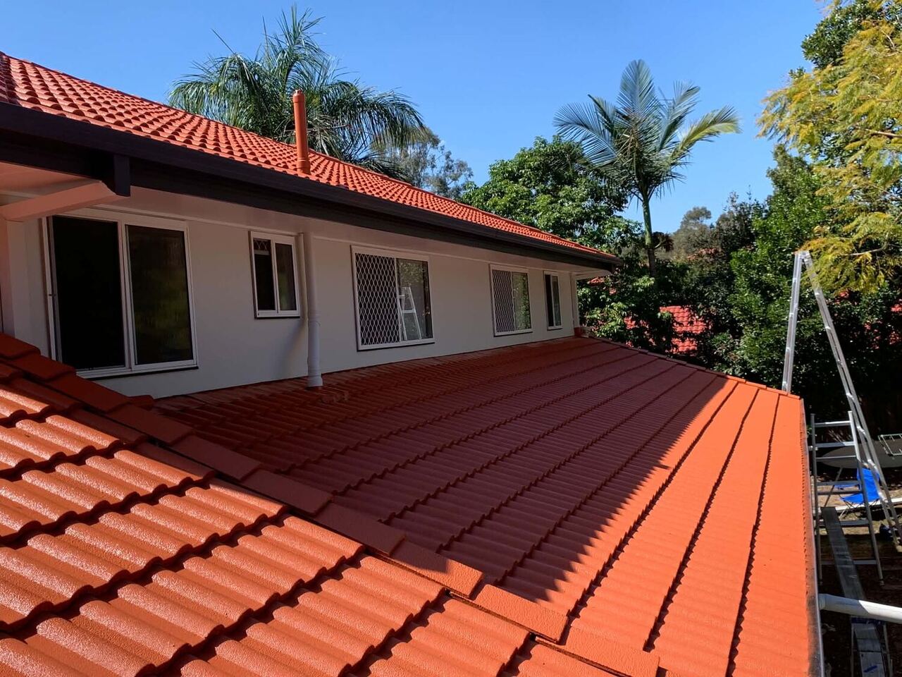 Restored terracotta tile roof on a Brisbane home