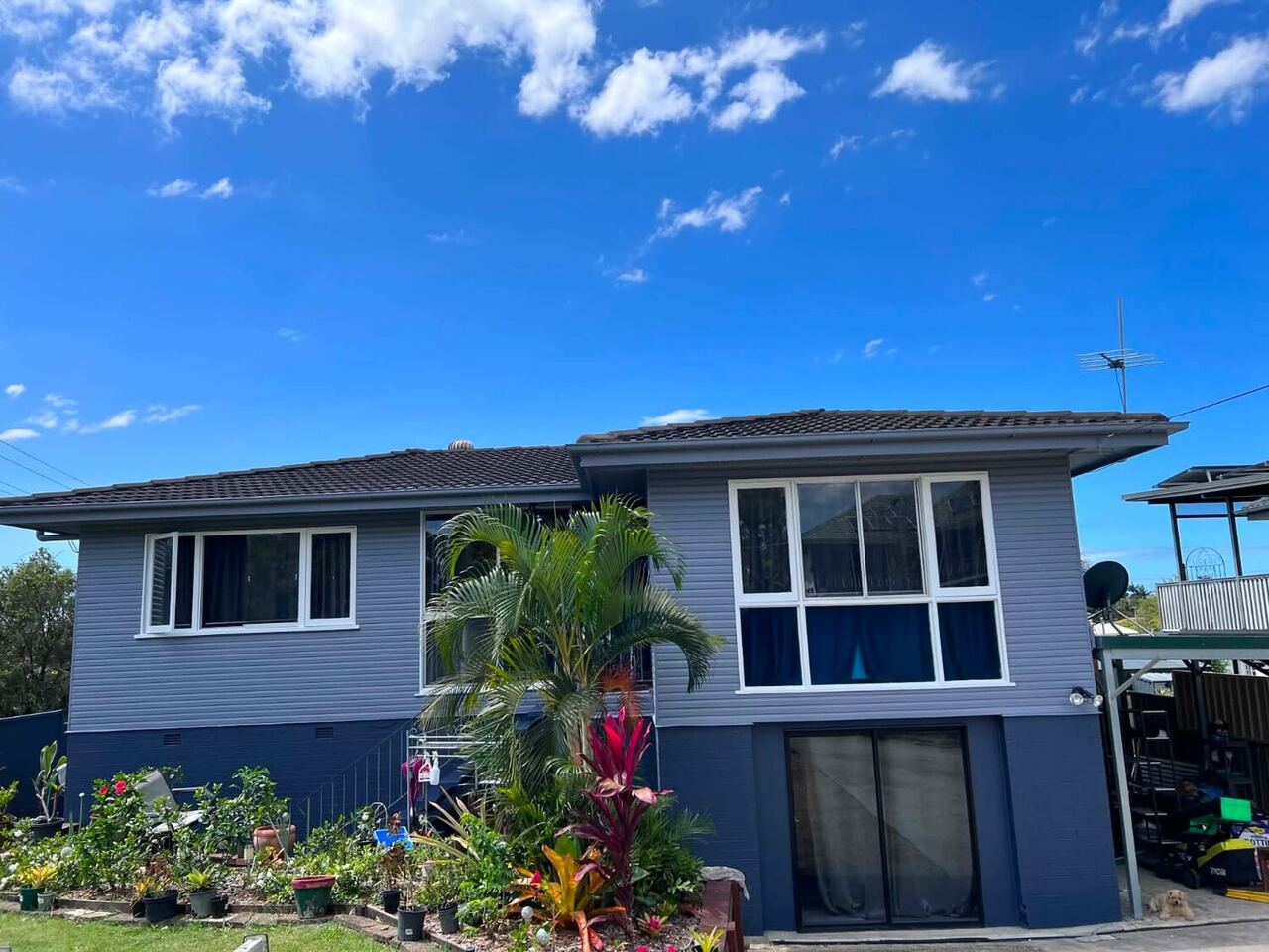 Repainted two-tone grey Brisbane home with a bay window